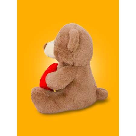 Игрушка мягкая Bebelot Мишка с сердечком 19 см темно-коричневый