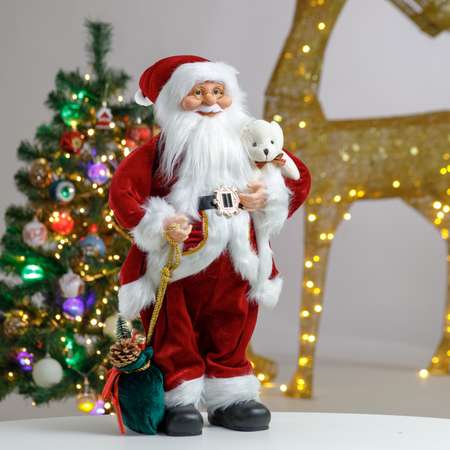 Фигура декоративная BABY STYLE Дед Мороз в бордовом костюме с белым орнаментом с мишкой и мешком подарков 60 см