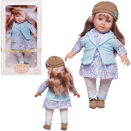 Кукла Junfa в теплой одежде в бело голубом платье голубом жилете и темной шапке 45 см