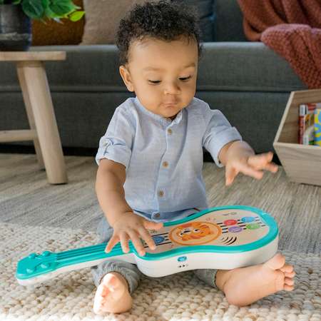 Музыкальная игрушка HAPE для малышей Гавайская гитара сенсорная голубая