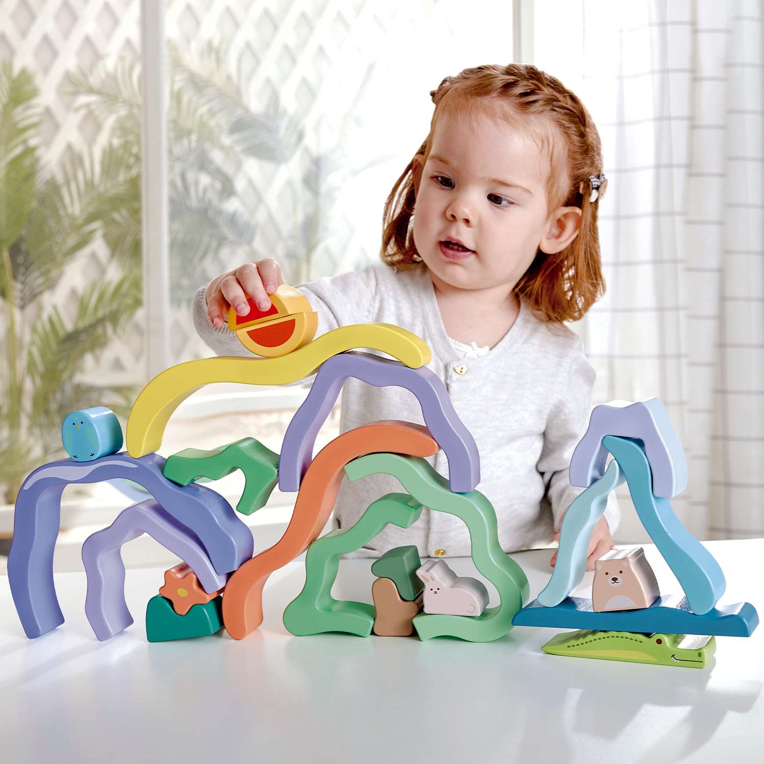 Развивающая игрушка Hape 3 в 1 В джунглях для малышей (пирамидка пазл игра-балансир) по всему миру - фото 1