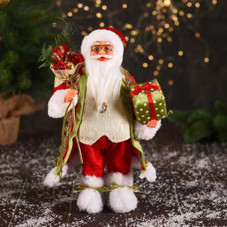Дед мороз Зимнее волшебство «В колпачке и с коробкой подарков в горошек» 30 см красно-зелёный