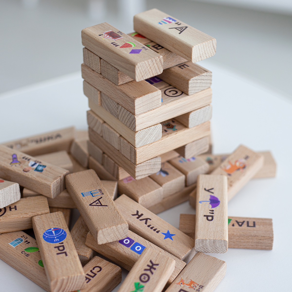 Настольная игра Leader Дженга Башня с ребусами из 54 элементов в деревянном ящике - фото 7