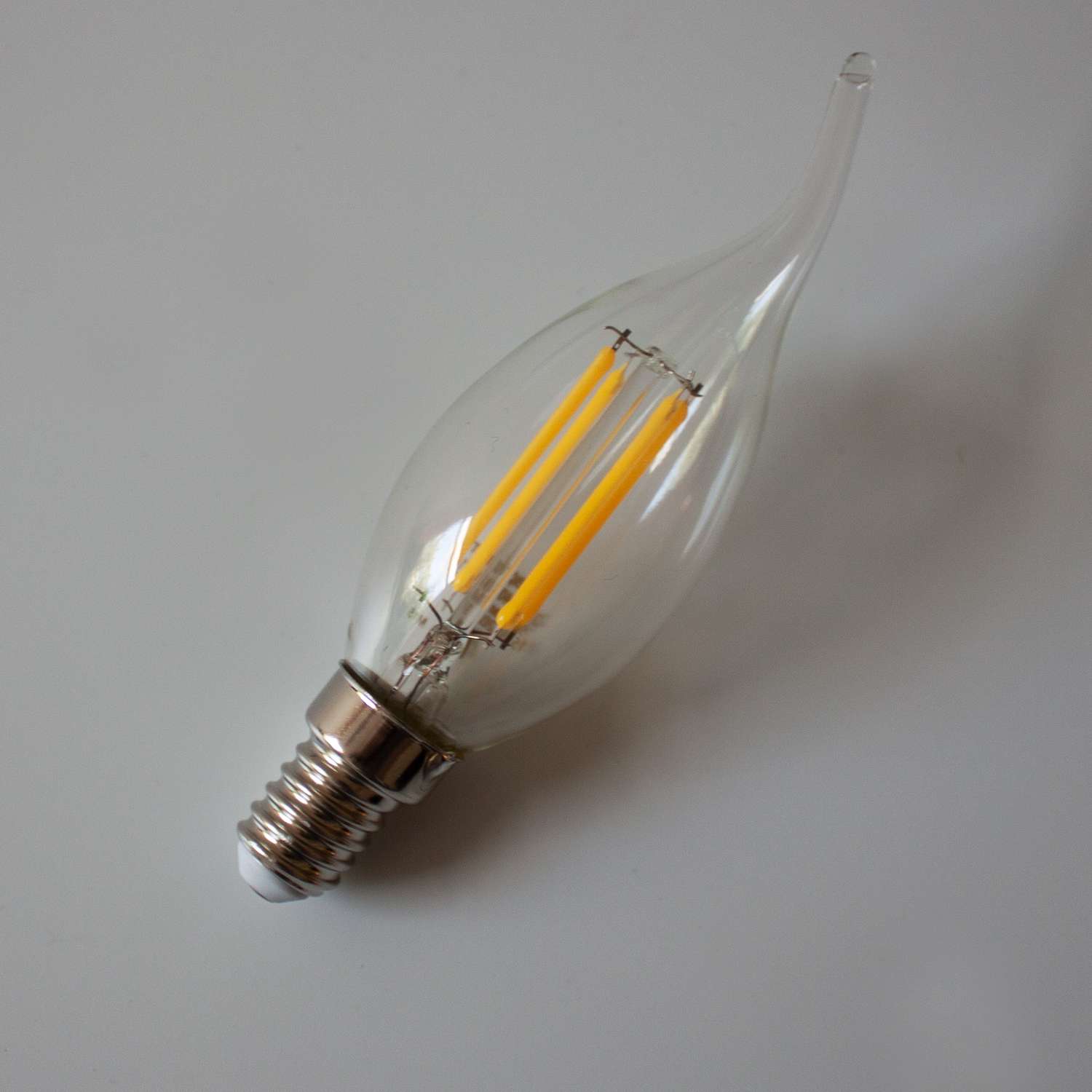 Лампа филаментная Фарлайт нитевидная прозрачная свеча на ветру СW35 11 Вт 4000 К Е14 - фото 1