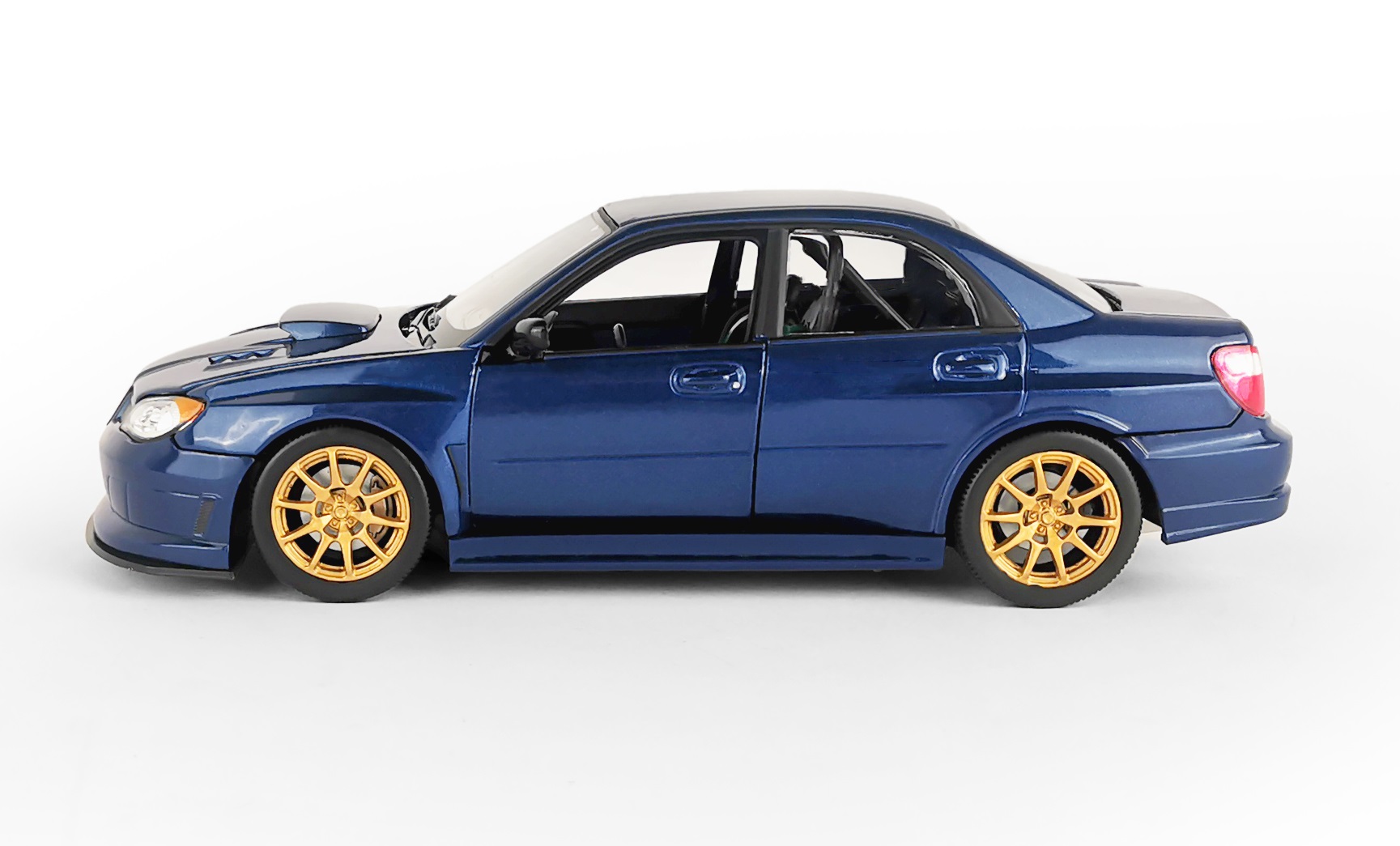 Машинка WELLY 1:24 Subaru Impreza WRX STI синяя