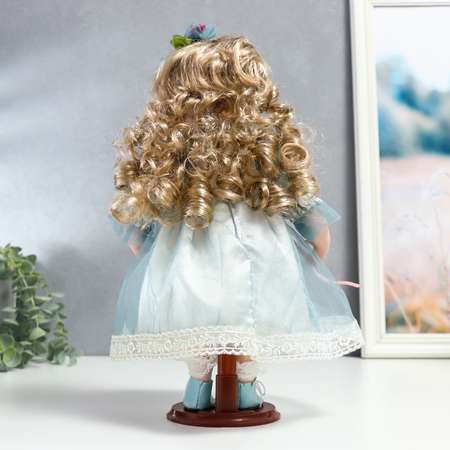Кукла коллекционная Зимнее волшебство керамика «Флора в бело-голубом платье и лентой на голове» 30 см