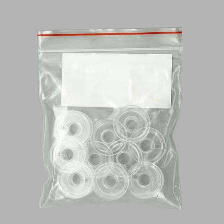 Шпулька Айрис пластиковая прозрачная для бытовых швейных машин типа Зингер 10 шт