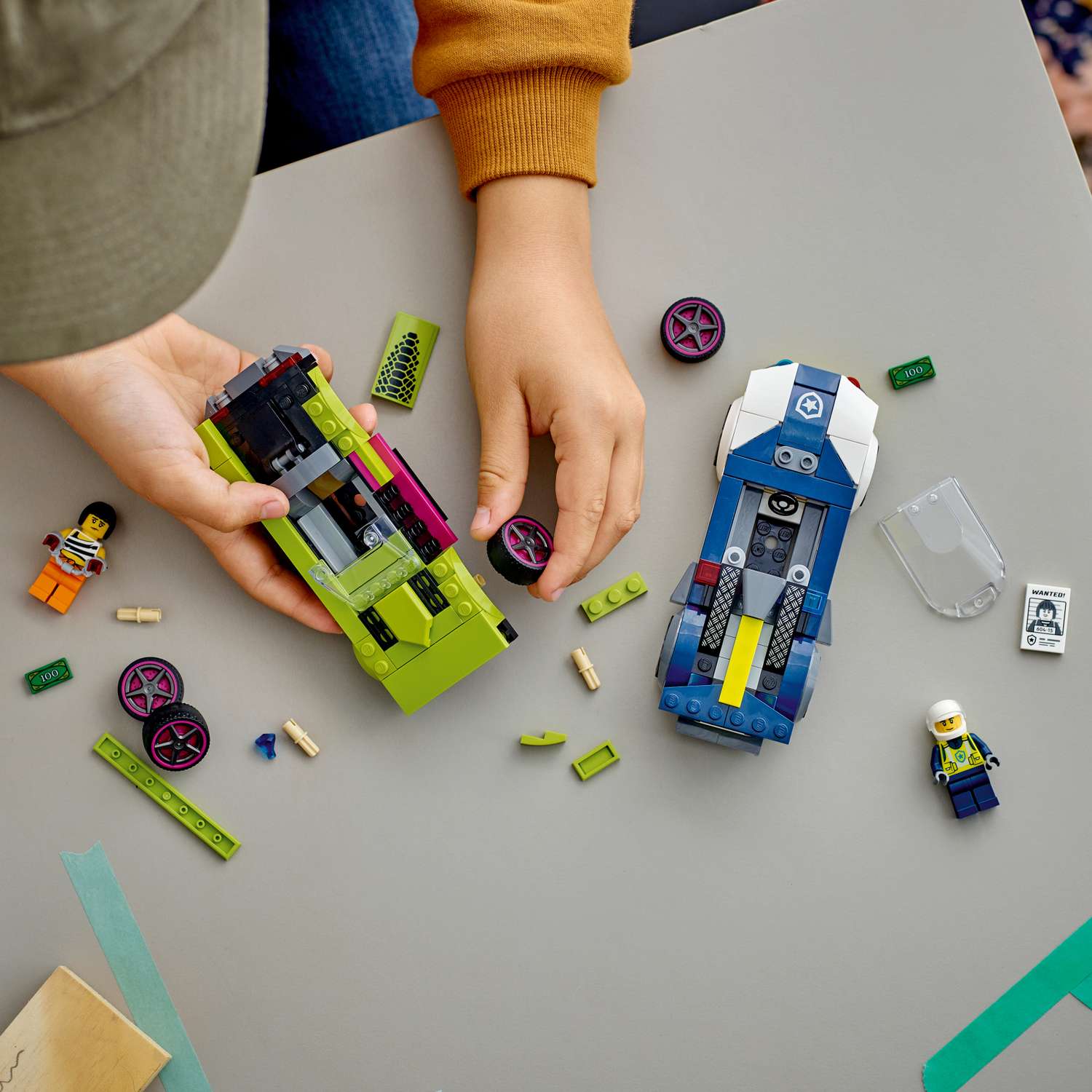 Конструктор LEGO City Погоня на полицейской машине и Маслкаре 60415 - фото 10