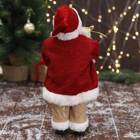 Дед мороз Зимнее волшебство «В золотисто-красном костюме с ремешком с подарками» 15х30 см