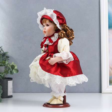 Кукла коллекционная Зимнее волшебство керамика «Мила в красно-белом платье и чепчике» 30 см