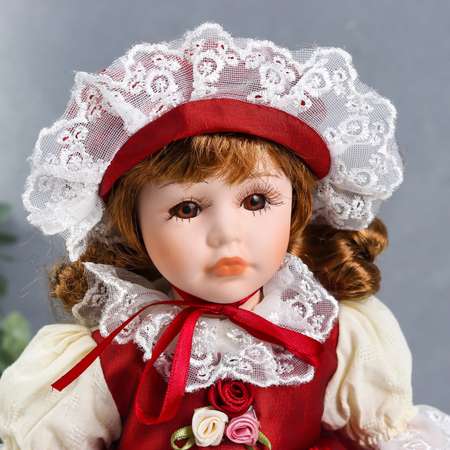 Кукла коллекционная Зимнее волшебство керамика «Мила в красно-белом платье и чепчике» 30 см