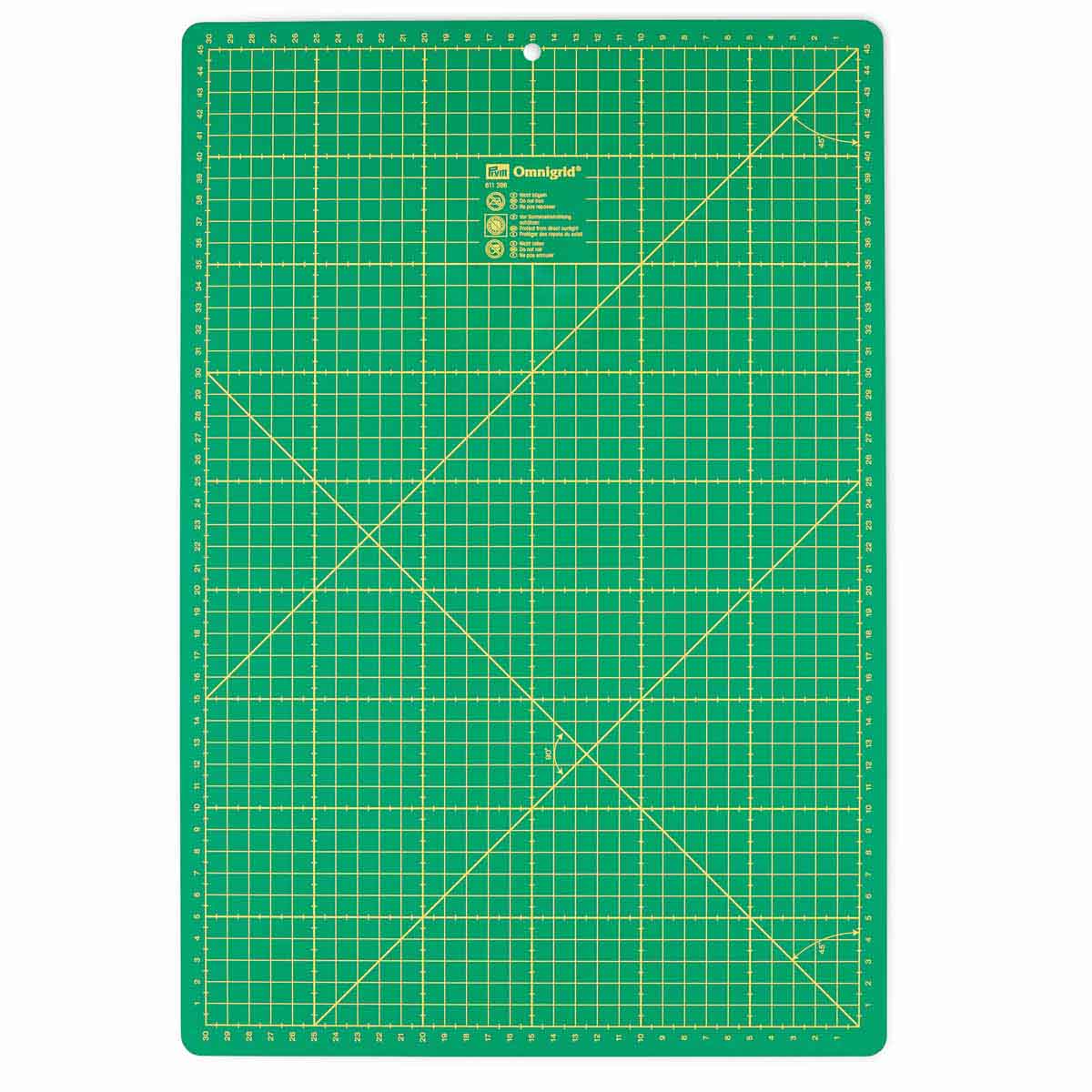 Коврик - подложка раскройный Prym мат для резки ткани бумаги самовосстанавливающийся с разметкой зеленый 45 х 30 см 611386 - фото 1