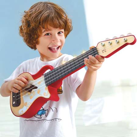 Музыкальная игрушка HAPE Гавайская гитара для детей Мерцающая укулеле красная