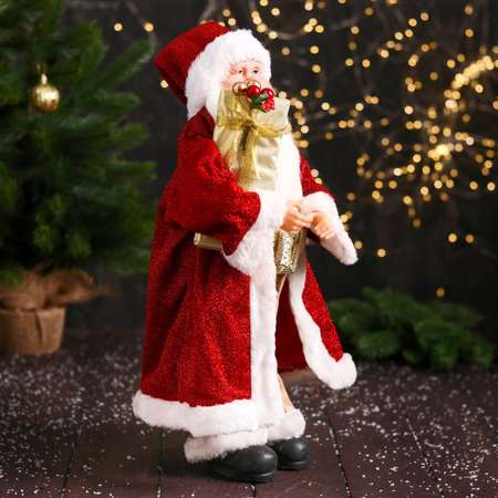 Дед мороз Зимнее волшебство «В колпачке подарком и ягодами» 46 см красный