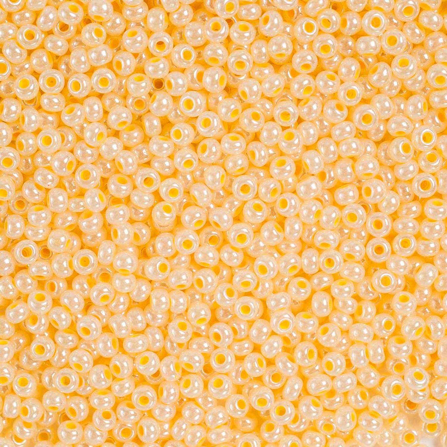 Бисер Preciosa чешский эффект алебастра блестящий с цветным центром 10/0 20 гр Прециоза 37386 желтый - фото 1