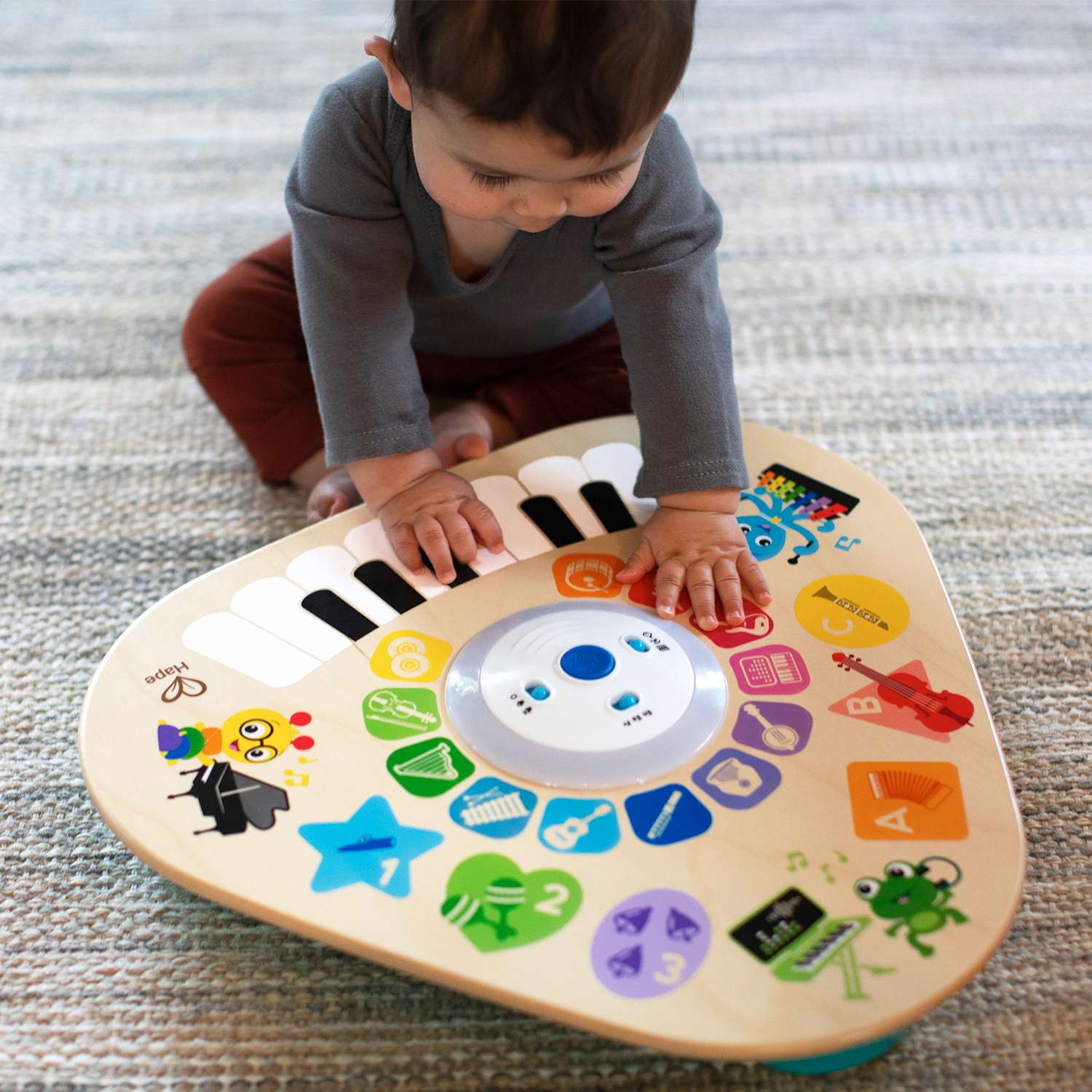 Серия Волшебное прикосновение HAPE Развивающая игрушка для малышей Музыкальный столик сенсорный - фото 1
