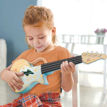 Игрушечная гавайская гитара HAPE Рок н ролл с брошурой обучения игре на гитаре