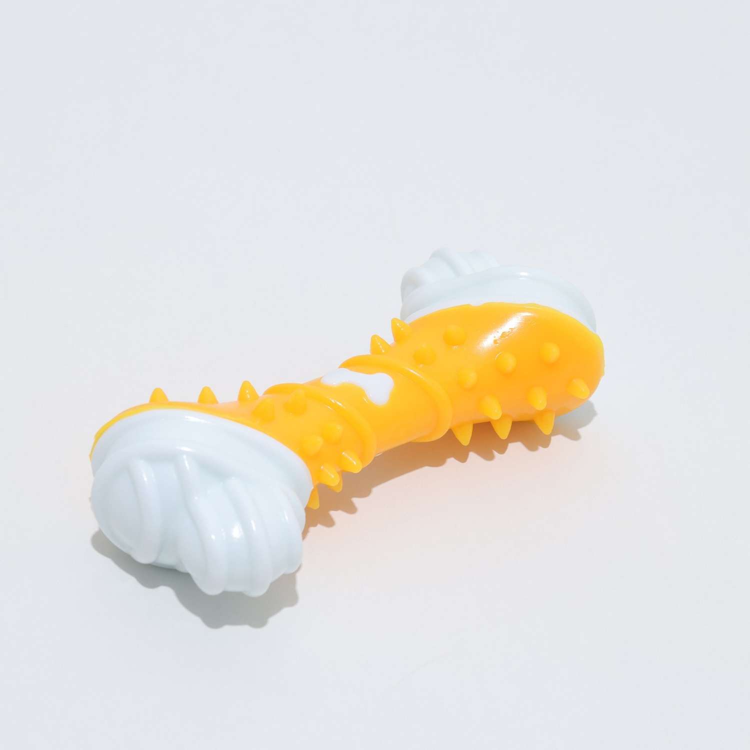 Игрушка Пижон двухслойная твердый и мягкий пластик «Кость» 12 см жёлтая - фото 2