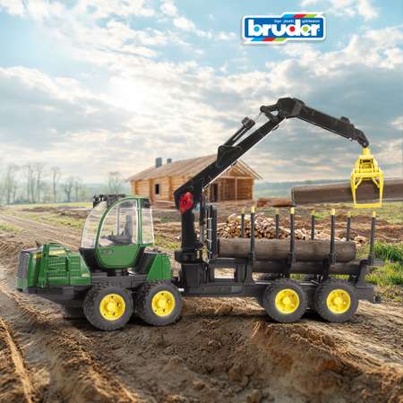 Трактор Bruder John Deere 1210E с прицепом