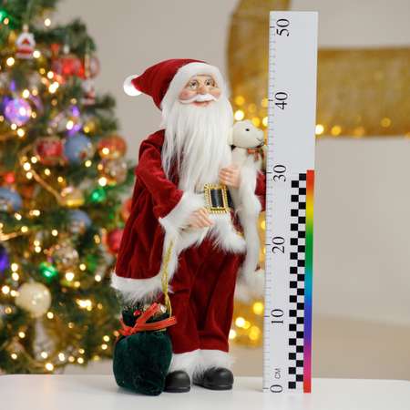 Фигура декоративная BABY STYLE Игрушка Дед Мороз в бордовом костюме с белым орнаментом с мишкой и мешком подарков 45 см