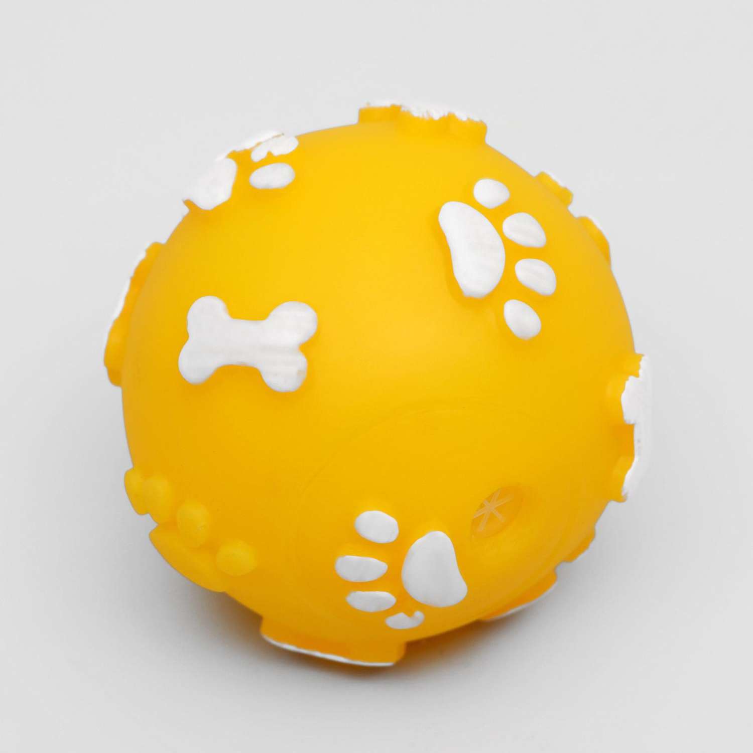 Игрушка для собак Пижон Мячик с пищалкой «Лапки» 5.5 см жёлтый - фото 1