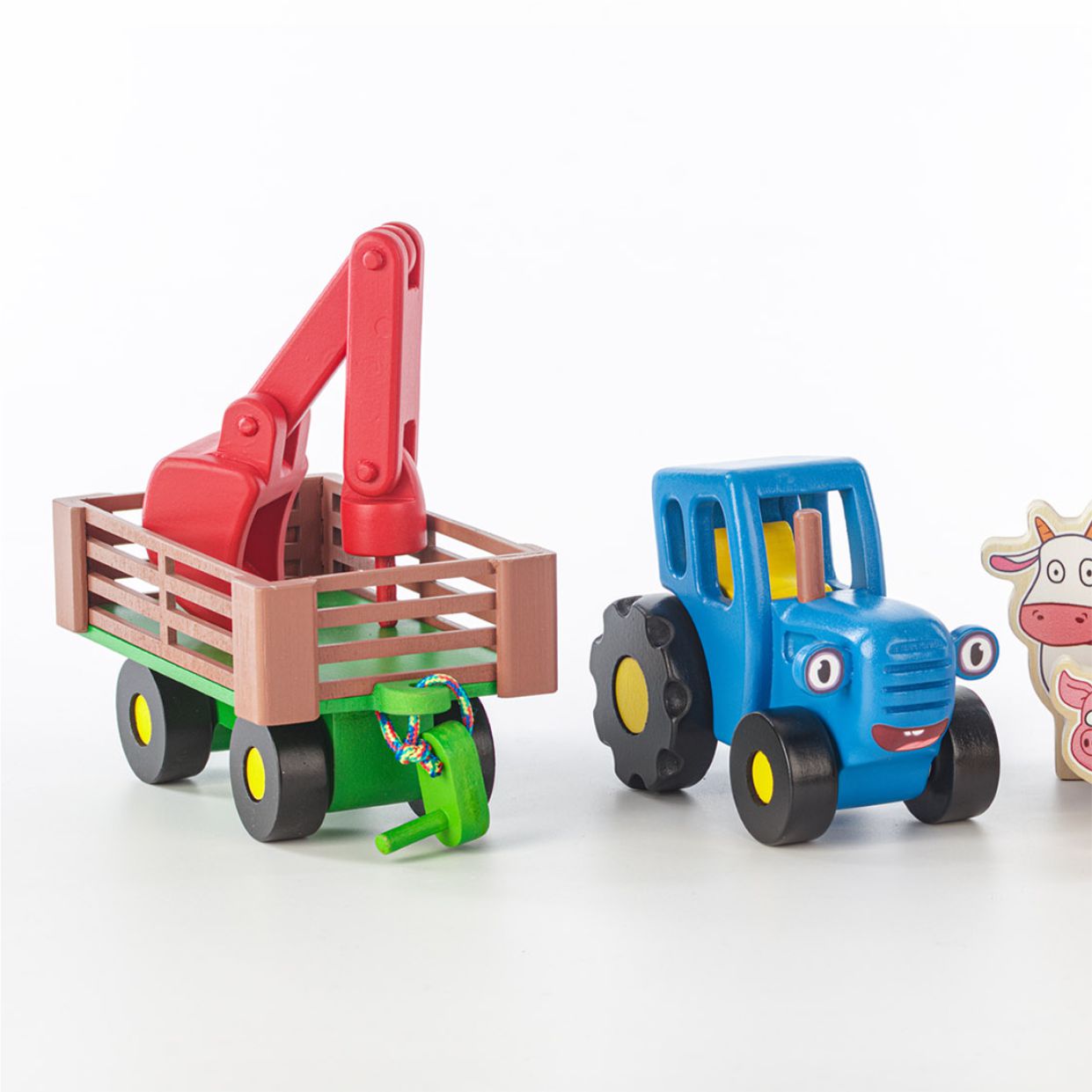 Игрушка Синий трактор с прицепом и животными - фото 7
