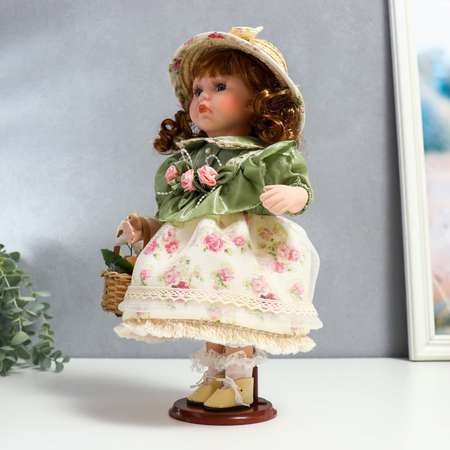 Кукла коллекционная Зимнее волшебство керамика «Энни в нежно-мятном платье шляпке и с корзинкой» 30 см