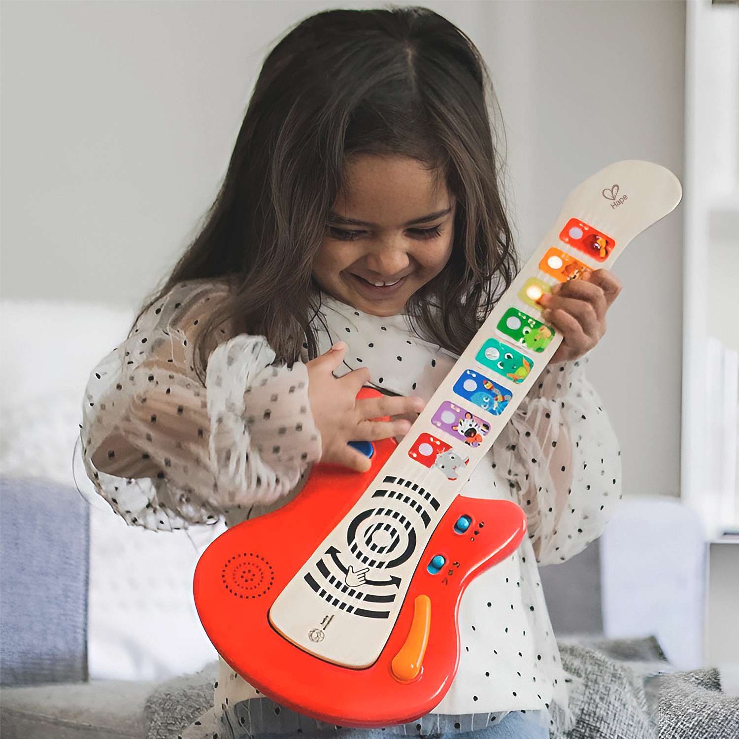 Серия Волшебное прикосновение HAPE Музыкальная игрушка для малышей Гитара сенсорная красная - фото 1