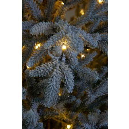 Искусственная елка Crystal Trees Персея в снегу с вплетенной гирляндой 185 см.