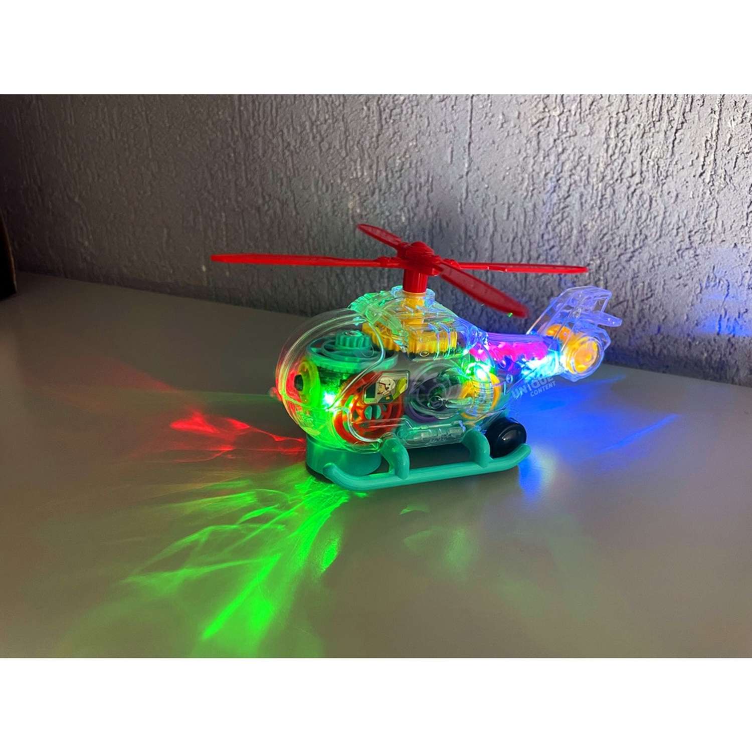 Вертолет прозрачный BalaToys С шестеренками светящийся музыкальный ВертолетПрозр - фото 8