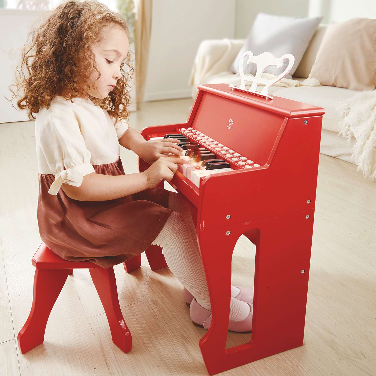 Музыкальная игрушка Hape Пианино с табуреткой цвет красный - фото 1