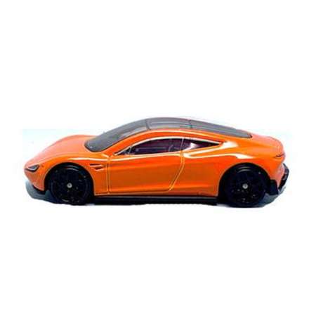 Автомобиль Hot Wheels Tesla roadster 1:64 оранжевый