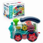 Музыкальная игрушка BONDIBON Паровозик с шестеренками со световыми эффектами и прозрачным корпусом серия Baby You