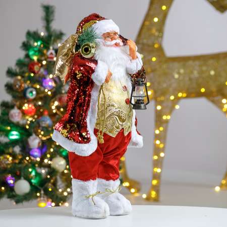 Фигура декоративная BABY STYLE Дед Мороз с пайетками в золотом жилете с фонариком в руке 60 см