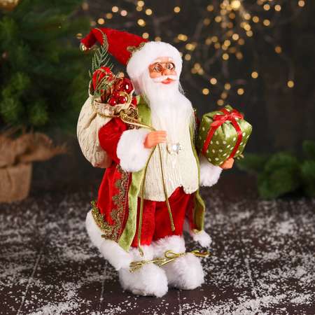 Дед мороз Зимнее волшебство «В колпачке и с коробкой подарков в горошек» 30 см красно-зелёный